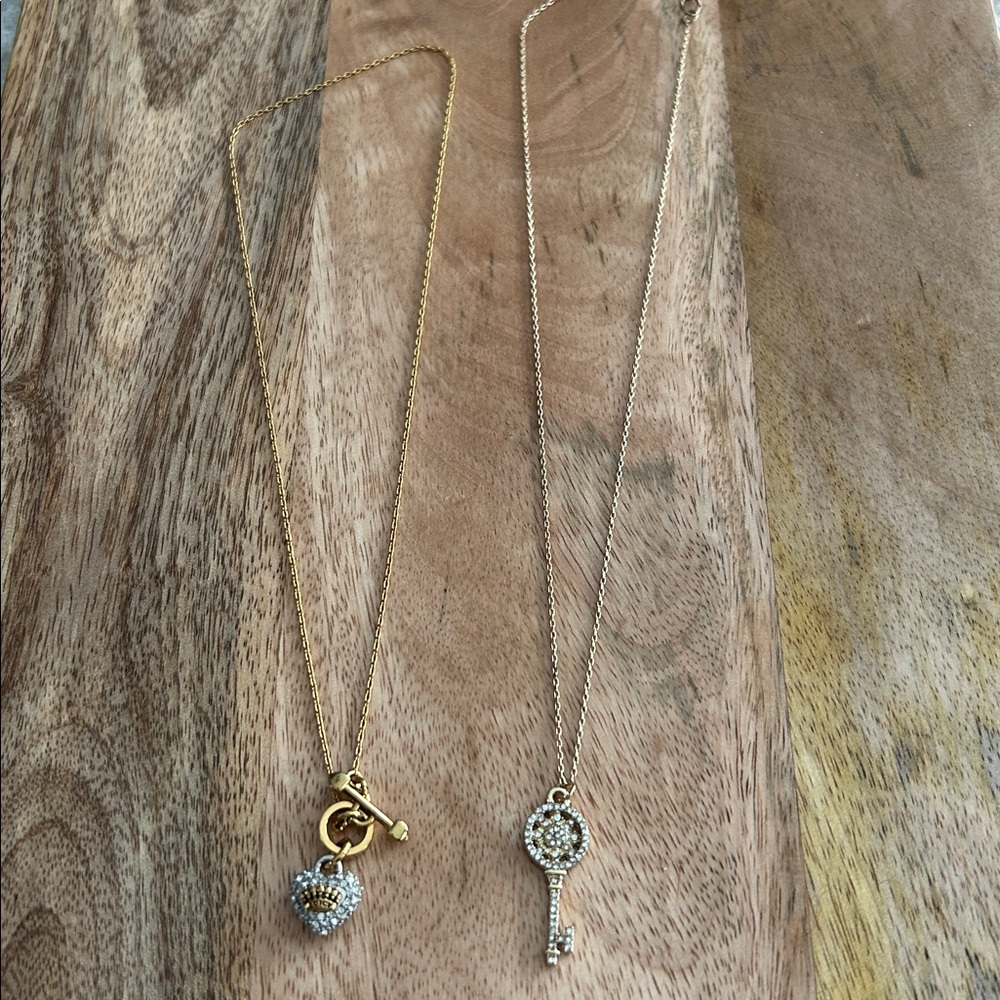 Juicy Couture choker style necklace . Comes with free key necklace